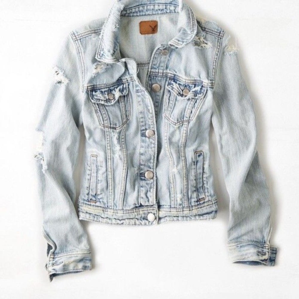 Distressed light wash denim jacket